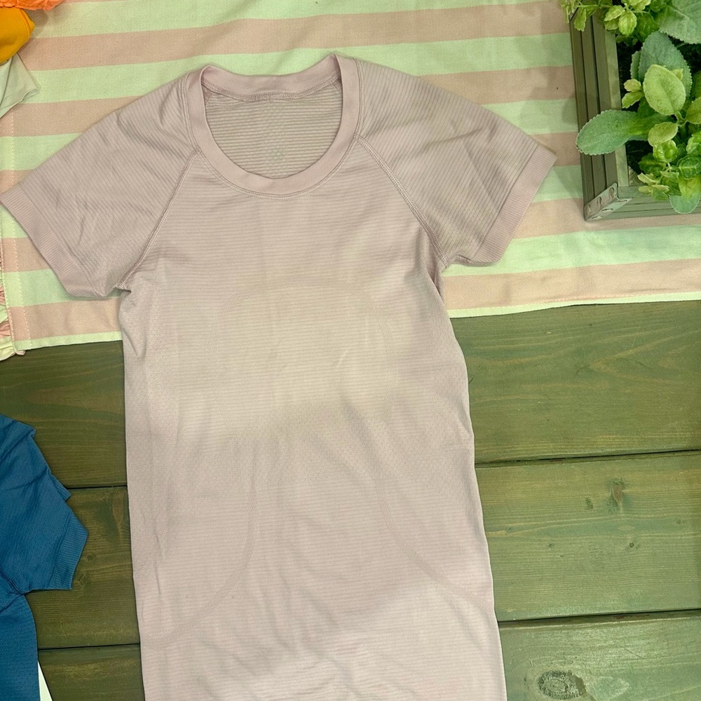 Light pink swiftly tech size 2